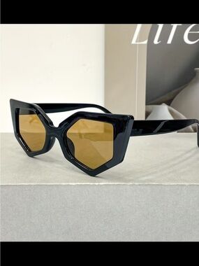 Affordable Fashion Finds Black Frame Sunglasses with Amber Lenses